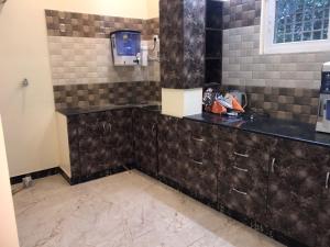 Η κουζίνα ή μικρή κουζίνα στο Raj Homes, Tirunelveli