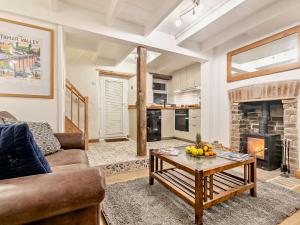 a living room with a couch and a table at 2 Bed in Gunnislake 89580 in Gunnislake +21 photos