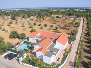 an overhead view of a house with an orange roof at Tavira Monte in Tavira