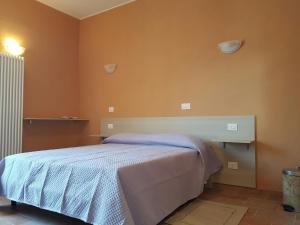 Ένα ή περισσότερα κρεβάτια σε δωμάτιο στο Perla Nera Guesthouse +9 φωτογραφίες