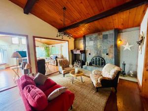 Posezení v ubytování Spa & Waterfront - Chalet le Colibri