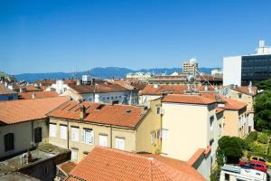 a view of roofs of buildings in a city at Apartment Mia in Rijeka