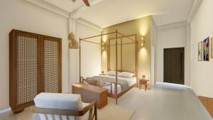 ein Schlafzimmer mit einem Bett und einem Stuhl in einem Zimmer in der Unterkunft Chaarya Lake in Nikawatawana