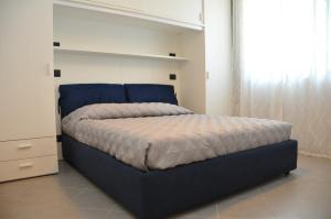Кровать или кровати в номере Villaggio La Piana