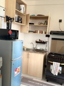 Dapur atau dapur kecil di Greenzone Apartment