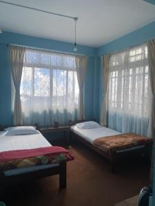 Katil atau katil-katil dalam bilik di Sadamo Homestay