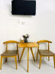 TV a/nebo společenská místnost v ubytování Thai Binh Motel