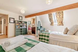 Postel nebo postele na pokoji v ubytování Church Farmhouse Annexe