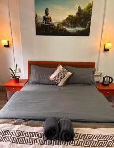 Ένα ή περισσότερα κρεβάτια σε δωμάτιο στο Hotel peace