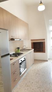 Kuchyň nebo kuchyňský kout v ubytování Casa della Nonna Polignano a mare