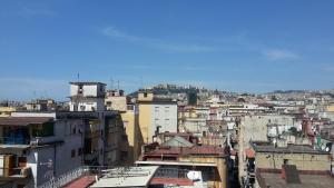 a view of a city with buildings at O' Paese E Masaniello in Naples