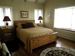 Ένα ή περισσότερα κρεβάτια σε δωμάτιο στο Superb Mountain Getaway near Cherokee National Forest in Reliance, Tennessee
