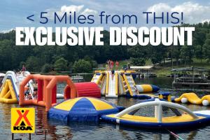 a group of inflatable slides in the water at Outstanding Lakefront Cabin in Makanda, Illinois in Sunset Harbor