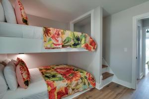 a bedroom with a bunk bed with pillows at Magical Family Cabin with Breathtaking Beauty and Modern Interior in Alabama in Grant +28 photos