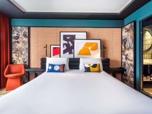 Postel nebo postele na pokoji v ubytování Mercure Dijon Centre Clemenceau + 182 fotografií