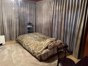 Postel nebo postele na pokoji v ubytování Iojima BeachHouse - Vacation STAY 97622v