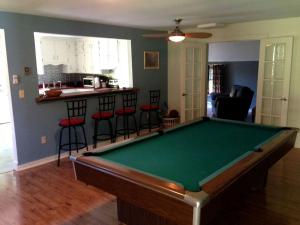 a kitchen with a pool table in a living room at Pet-Friendly Cabin Rental for Family Getaway in Lexington, Virginia in Timber Ridge +10 photos