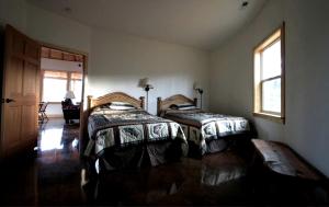Ένα ή περισσότερα κρεβάτια σε δωμάτιο στο Deluxe Glamping Cabins at River Farm in Virginia