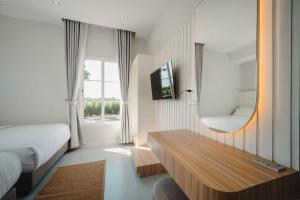 TV a/nebo společenská místnost v ubytování MiraMaya Luxury Mountain View Private Pool Villa 4