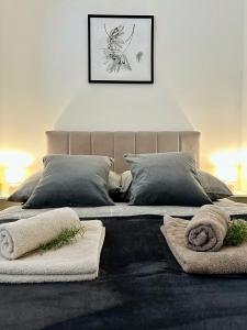 En eller flere senge i et værelse på Apartman Toni