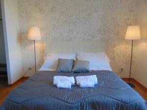 Postel nebo postele na pokoji v ubytování Circo Massimo stanze