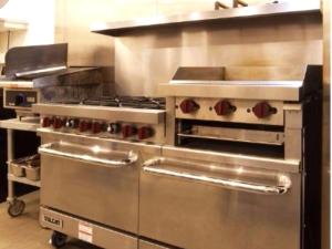 a kitchen with stainless steel appliances in a kitchen at Spacious Vacation Rental for Groups or Events with Sauna and Hot Tub in Athol, Idaho in Athol +14 photos