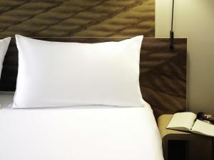 Postel nebo postele na pokoji v ubytování Hotel ibis Porto Gaia