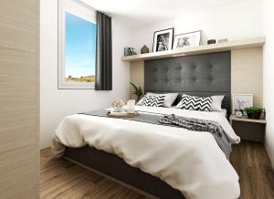 a bedroom with a large bed and a window at Magical Retreat with a Pool Ideal for Luxury Camping, Austria in Unterlibitsch