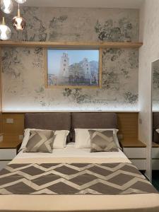 Postel nebo postele na pokoji v ubytování Orchidea Holiday