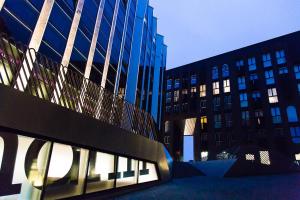 a group of tall buildings in a city at Bright Studio in Rotermann Quarter - Noor Apartment in Tallinn