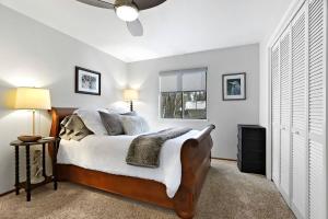 a bedroom with a large bed and a window at Inspiring Cottage Rental for a Vacation in California Wine Country in Lockeford
