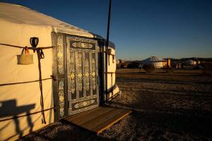 a door on the side of a building at Family-Friendly Yurt for Stargazing near Joshua Tree National Park, California in Sunfair Heights