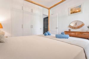 Postel nebo postele na pokoji v ubytování Blanca del Sol Oasis Duna + 20 fotografií