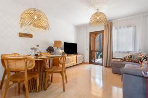 TV a/nebo společenská místnost v ubytování Blanca del Sol Oasis Duna