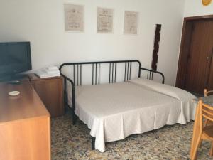 Posteľ alebo postele v izbe v ubytovaní Antonella's House