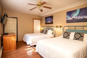 a bedroom with two beds and a ceiling fan at Weekend Getaway for Outdoor Recreation near San Isabel Forest in Colorado in Monarch