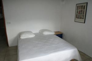 Postel nebo postele na pokoji v ubytování Gîte Laboule pour 4 personnes