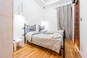 Postel nebo postele na pokoji v ubytování Colombo house