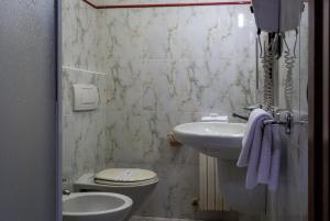Koupelna v ubytování Hotel Bernardino