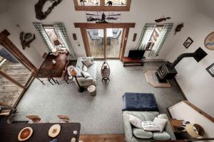 a living room with a couch and chairs at Lustrous Lakefront Cabin Oasis near Lake Ferndale in West Virginia in Springfield +46 photos