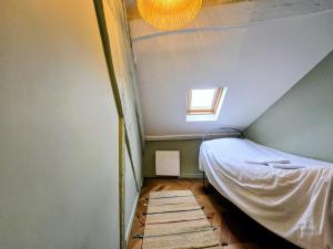 Кровать или кровати в номере Duplex spacieux 2 Chambres au Centre-Ville Auxerre