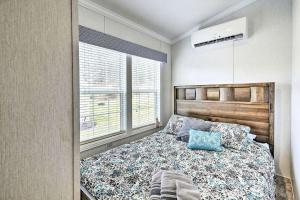 a bedroom with a large bed and a window at Great Vacation Complex for the Best Pennsylvania Glamping in Poyntelle