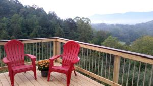 Nespecifikovaný výhled na hory nebo výhled na hory při pohledu z prázdninového domu