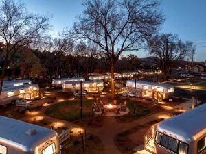 a group of camels parked in a parking lot at night at Modern Airstream Stay in Downtown Prescott AZ Near Whiskey Row in Prescott