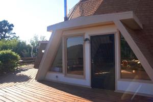 クラウドクロフトにあるImpressive Dome for Luxury Camping near High Rolls, NMの家の側面大きなガラス戸 +30枚の写真