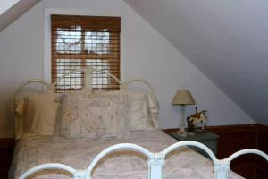 a bedroom with a bed and a window at Pet-Friendly Rental with Wi-Fi near Brenham, Texas in McDade