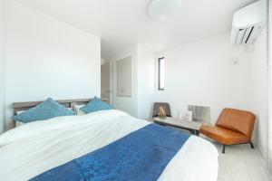 Postel nebo postele na pokoji v ubytování Brand New Shinjuku House 3BR 6pax only 4min to Station