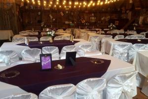a banquet hall with white tables and white chairs at Roomy Vacation Rental for Two with a Private Bathroom near Cedar Rapids, Iowa in Montezuma