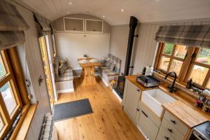 an aerial view of a kitchen in a tiny house at Driftwood with Hot Tub in Corpach