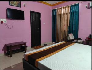 Postel nebo postele na pokoji v ubytování Hotel venam